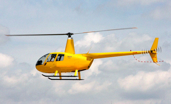 На фото ‒ ресурсный вертолет Робинсон